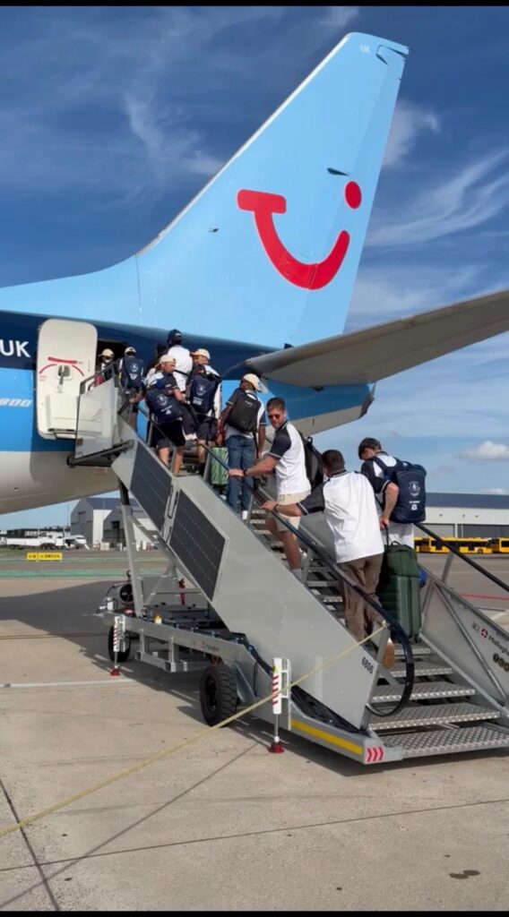 Players boarding plane in the European T20 League